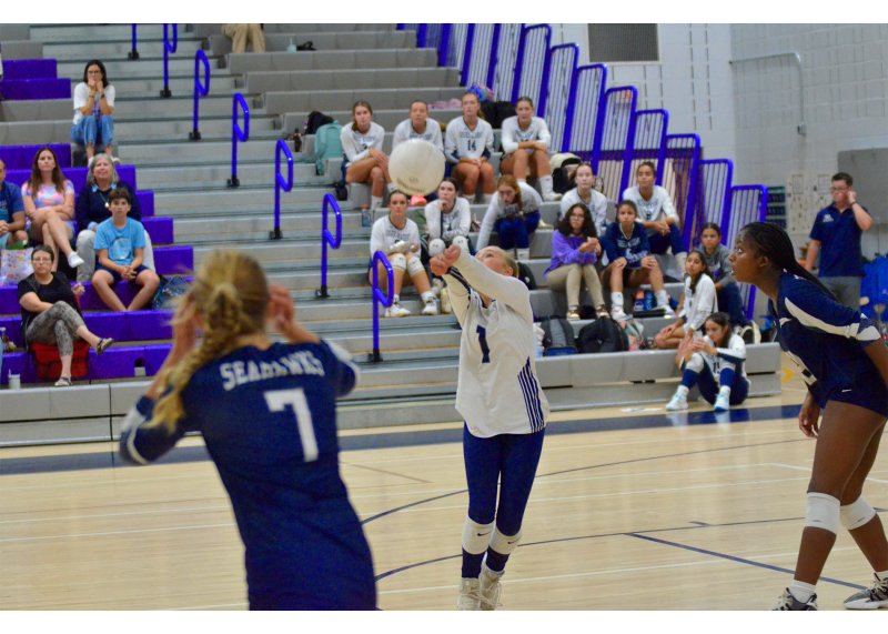 Sussex Academy JV libero Liliana Gatti bumps the ball.